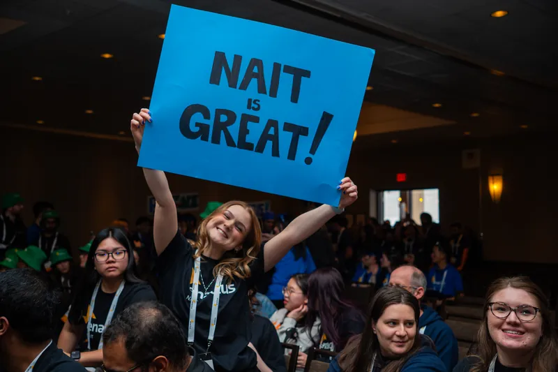 Enactus NAIT team cheering at Regionals